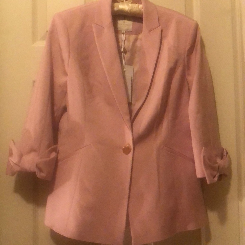Light pink blazer bow on the sleeve by Ted Baker.